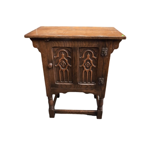 457 - Small oak single door cabinet. W61cm D36cm H71cm