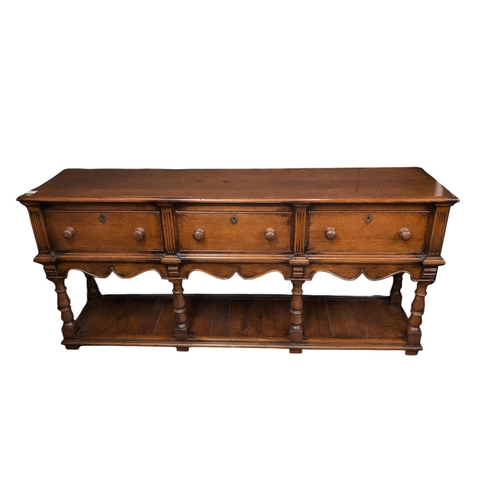 458 - Oak dresser base sideboard, with 3 drawers. W188cm D47cm H87cm