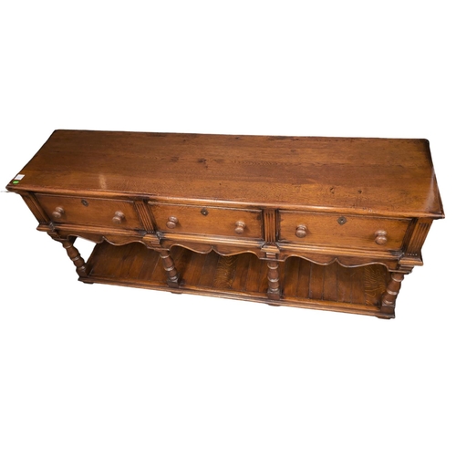 458 - Oak dresser base sideboard, with 3 drawers. W188cm D47cm H87cm