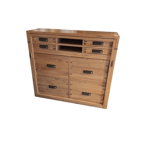 478 - Halo Montana office chest, in nibbed oak. Comprised of 4 upper small drawers, over lower cupboard &a... 