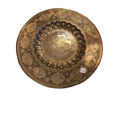 482 - Brass topped benares table. D62cm H50cm