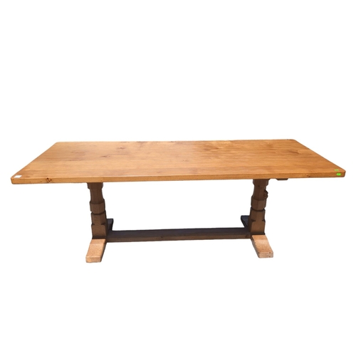 489 - Mouseman 7ft refectory dining table with rectangular adzed top, two octagonal pillar supports raised... 