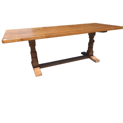 489 - Mouseman 7ft refectory dining table with rectangular adzed top, two octagonal pillar supports raised... 