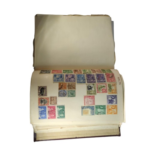 15 - Well-filled stamp album of world stamps, alphabetically catalogued.