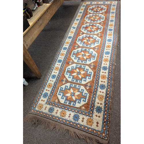 284 - Geometric pattern Runner rug, hand knotted 325cm by 104cm approx