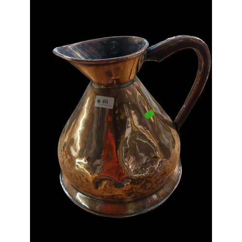 46 - 2 gallon copper jug. H31cm, Diameter of base 32.5cm.