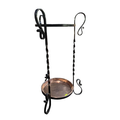 56 - Wrought iron umbrella/stick stand with copper base. H69cm, Diameter at base 35cm.