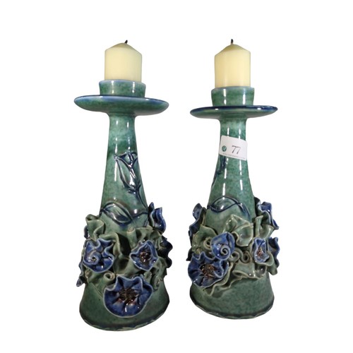 77 - Pair of glazed, ceramic candlesticks. Signatures to base. H23cm. 