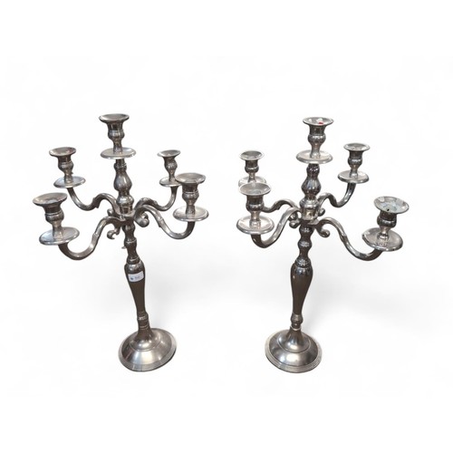 86 - Pair of Culinary Concepts, plated candlesticks. H62cm. Each holds 5 candles. 