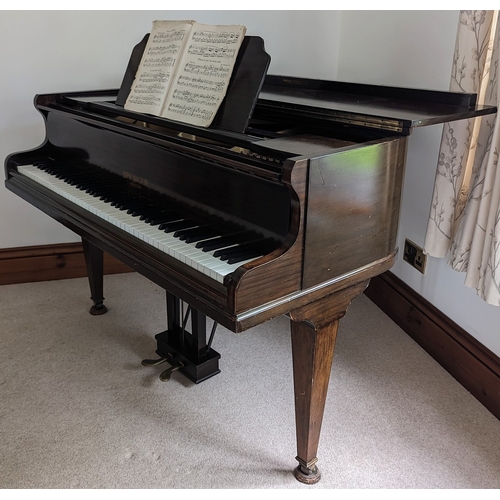 506 - A Spencer baby grand piano.This item is not on-site, and not available for viewing.Sold due to house... 