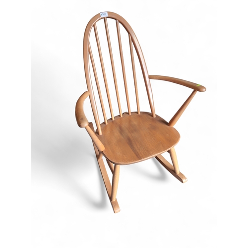 509 - Ercol Windsor Quaker rocking chair, model 428. Natural finish. Includes popper seat cushion