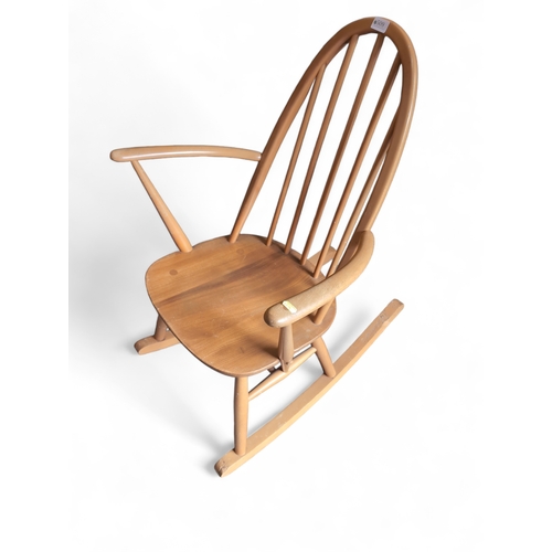 509 - Ercol Windsor Quaker rocking chair, model 428. Natural finish. Includes popper seat cushion