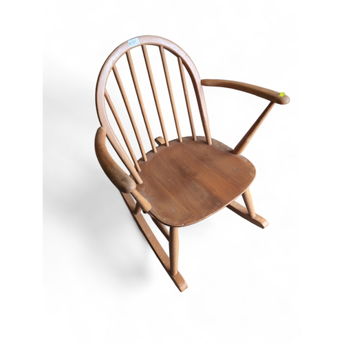 510 - Ercol Windsor Tub-rocking chair, model 470. Natural finish. Includes popping seat cushion.