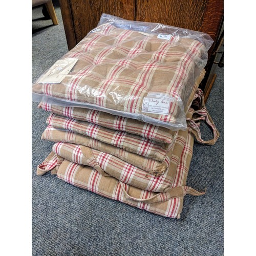 511 - Six cotton tie-on chair cushion pads in tan and red check 38 x 38xm