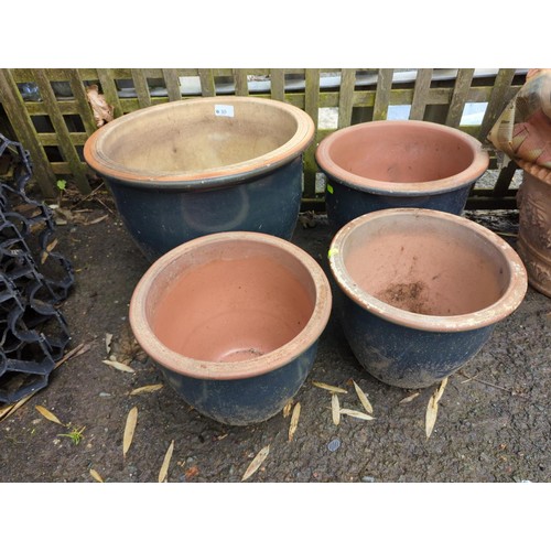 10 - 4 glazed pots of various sizes. Largest diameter - 39cm.