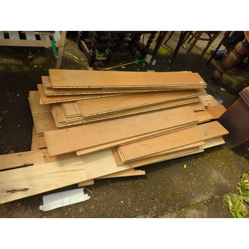 128 - Quantity of different lengths of interlocking laminate flooring. Longest - L165cm, W15.5cm, D1.5cm.