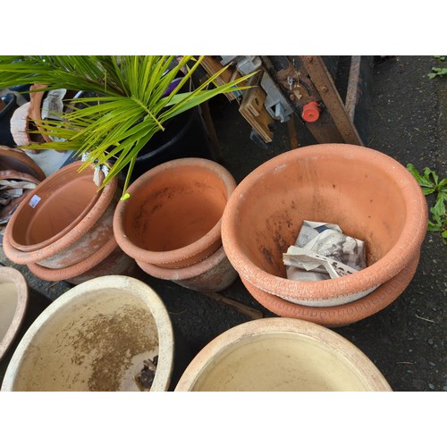 134 - 7 terracotta pots, various sizes, largest ht 29cms, diam 37 cms