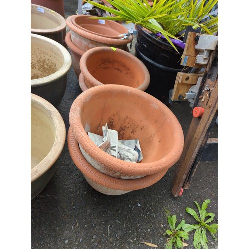 134 - 7 terracotta pots, various sizes, largest ht 29cms, diam 37 cms