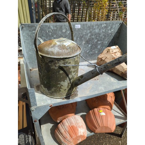 141 - Galvanised 2 gallon watering can, small damage to spout