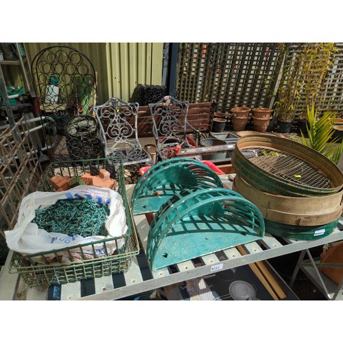 143 - 4 green painted alloy wall baskets, diam 37cms depth 19cms  with 3 garden sieves