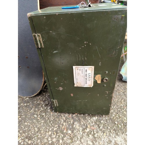 153 - Lockable front opening green metal box with key and handles, marked W.M.P. Ltd 1953 ER