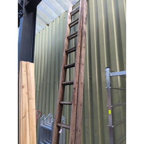 22 - Large, extendable wooden ladder (over 3.5m).