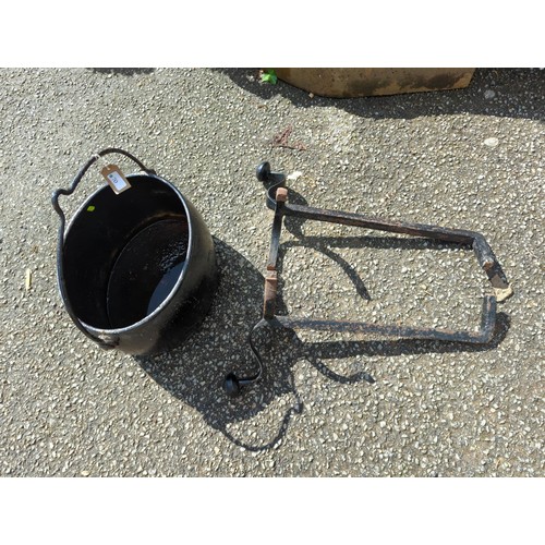 70 - Large, cast iron cooking pot/cauldron + 2 fire dogs. 