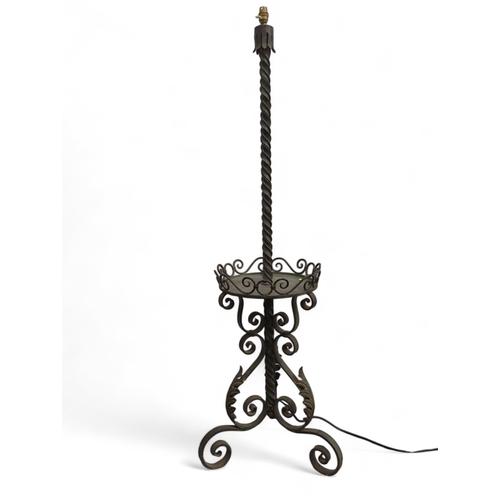 838 - Wrought iron standard lamp. H156cm.