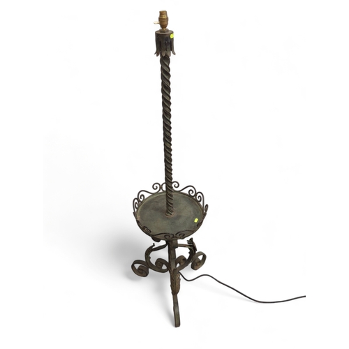 838 - Wrought iron standard lamp. H156cm.