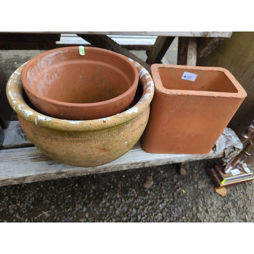 197 - 3 various terracotta pots, largest diam 30 x ht 21 cms, plus rectangular hollow terra cotta block