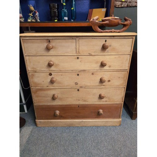 800 - Strip pine 2 over 4 chest of drawers. L116cm, D56cm, H115cm.