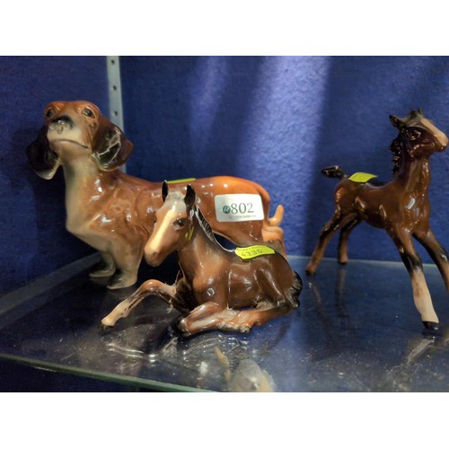 802 - 2 Beswick horses + 1 daschund. 