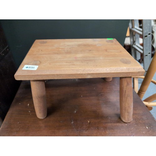 816 - Small wooden stool. W36cm, D26cm, H24cm.