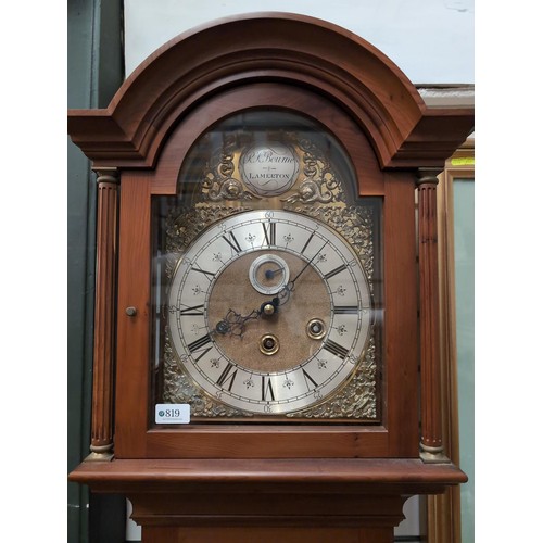 819 - Grandfather clock with brass face and Roman numerals. Plaque engraved 'R.K. Bourne, Lamerton'. W40cm... 