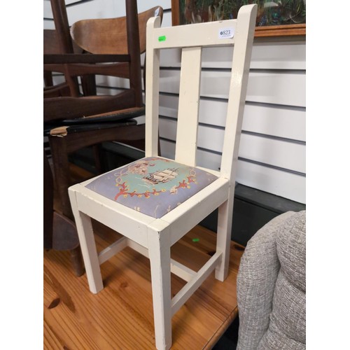 823 - White painted child's chair. Seat height 35cm. Overall height 74cm.