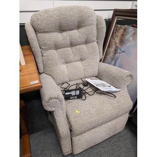 825 - Celebrity electric, reclining chair with textured oatmeal upholstery.