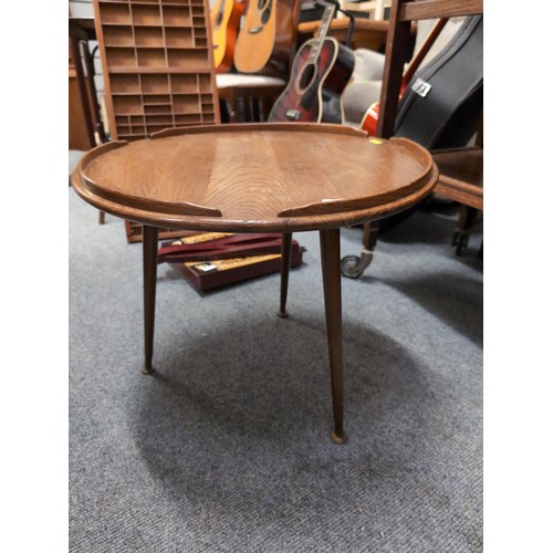 835 - Ercol Lazy Susan converted to coffee table with marriage legs. Diameter - 54cm. H43cm.