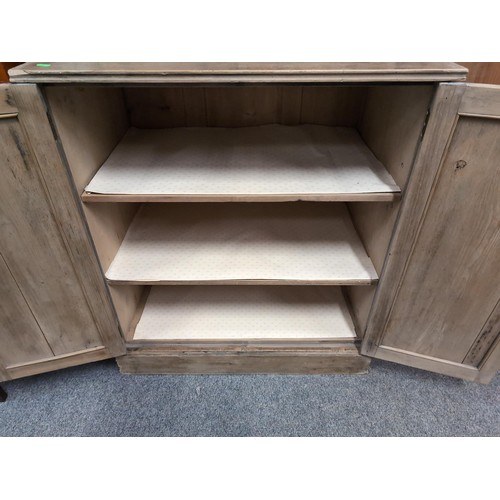 852 - Small, stripped pine, arch-topped, glazed dresser with 2 small drawers over cupboard. W82cm, D52cm, ... 