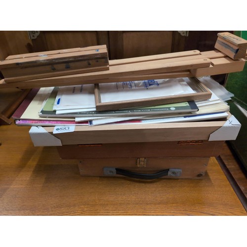 883 - Quantity of art equipment inc. easel, oil paints, assorted papers.