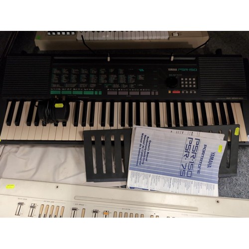 892 - Yamaha Portatone PSR-150 keyboard with stand.