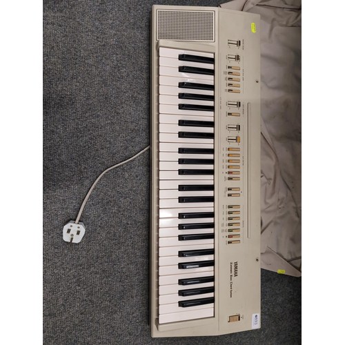 893 - Yamaha PS-20 keyboard with stand.