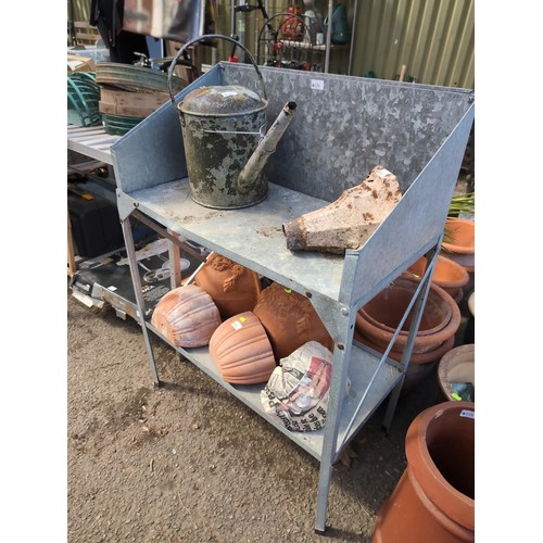 139 - Galvanised potting table with lower shelf. 76 x 39 x ht 106cms