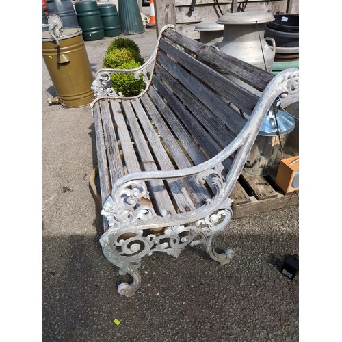 83 - Cast metal garden bench. W126cm, H82cm, D62cm.