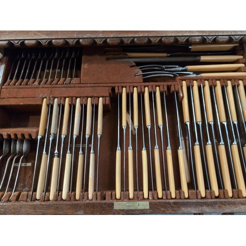 918 - Four drawer canteen of Prestons A1 silver plated cutlery, on cabriole legs W65 x D47 x H87cm, bottom... 