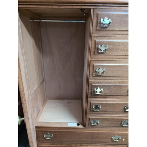 932 - Oak eight drawer wardrobe, width 107cm, depth 55.5cm, height 160cm