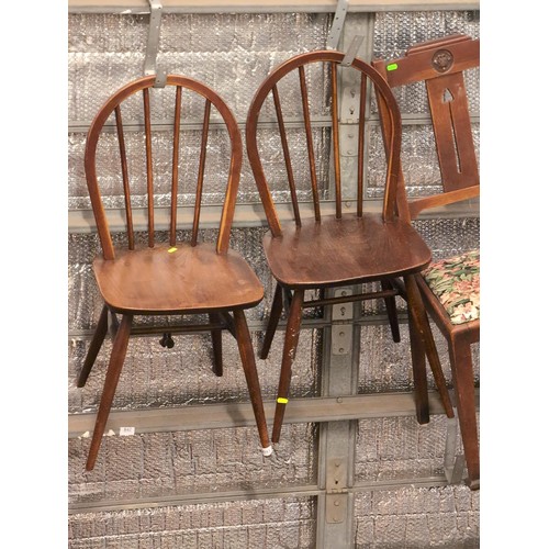 943 - Pair of dark Ercol steam bent stick back chairs