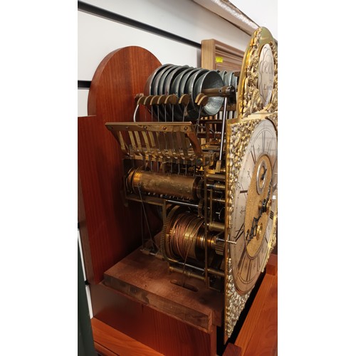 819 - Grandfather clock with brass face and Roman numerals. Plaque engraved 'R.K. Bourne, Lamerton'. W40cm... 