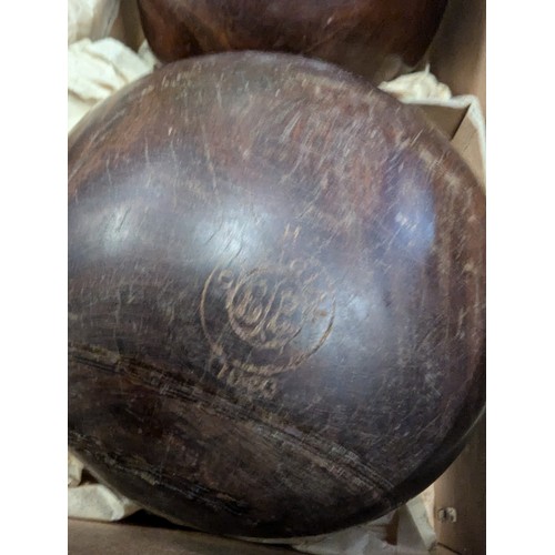 889 - 2 sets of 4 Henselite lignum vitae lawn bowls in original boxes.