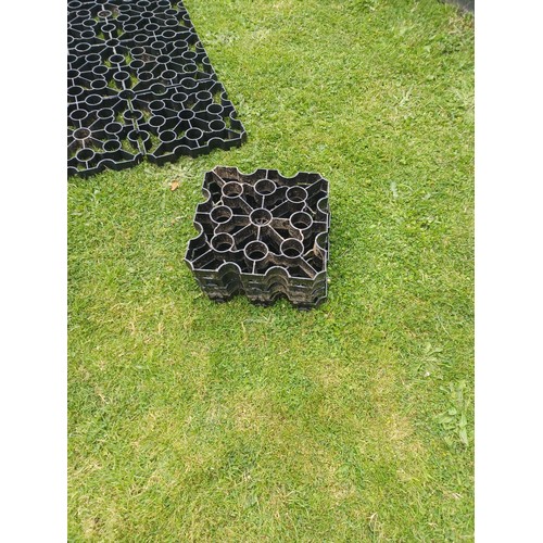 11 - 33 sections of plastic grid system flooring. each 33cmx33cmx4cm.