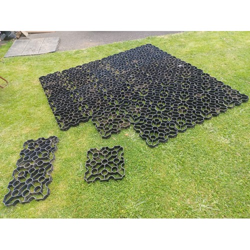 11 - 33 sections of plastic grid system flooring. each 33cmx33cmx4cm.